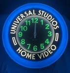 Nos Universal Studios Home Video Promotional Neon Art Deco Clock Man Cave Vtg. Fixed Price $500.00.