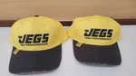 New No Tags Pair Jegs High Performance Baseball Hats Black / Yellow. Fixed Price $8.00.
